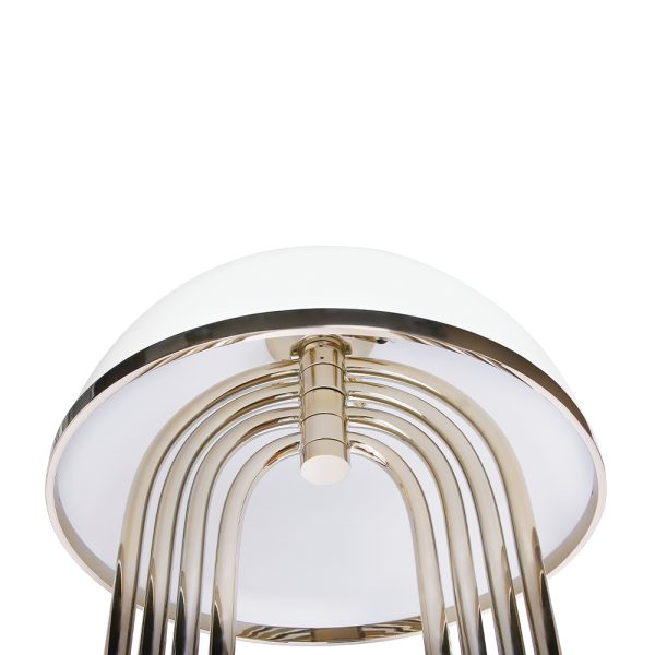 Turner floor lamp was inspired by Tina Turner’s electrifying dance moves. Ideal for any hotel design project, this art deco floor lamp will fit perfectly in a modern lobby entrance or next to a mid-century lounge chair. This mid-century floor lamp has five large arcs made of brass and a semi-spherical top cover of Aluminium lacquered in glossy white or any other RAL color of your choosing.