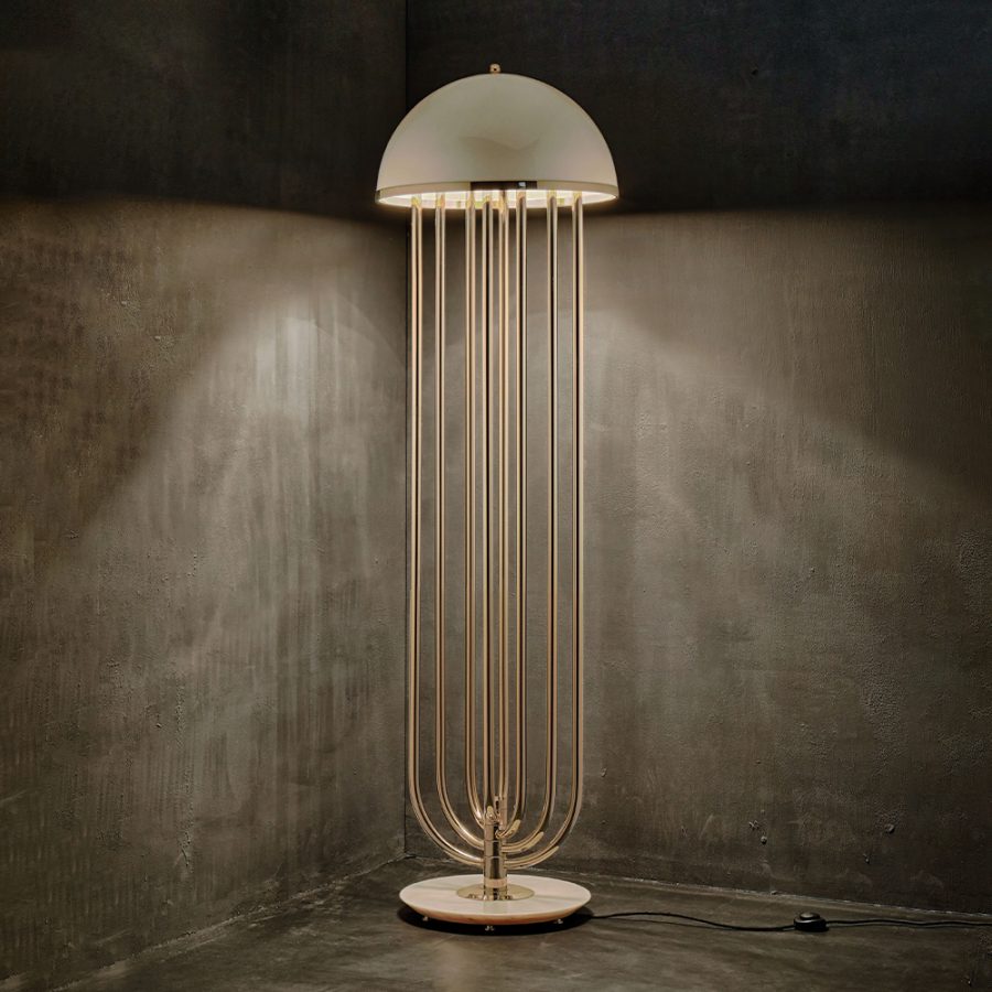 Turner floor lamp was inspired by Tina Turner’s electrifying dance moves. Ideal for any hotel design project, this art deco floor lamp will fit perfectly in a modern lobby entrance or next to a mid-century lounge chair. This mid-century floor lamp has five large arcs made of brass and a semi-spherical top cover of Aluminium lacquered in glossy white or any other RAL color of your choosing.