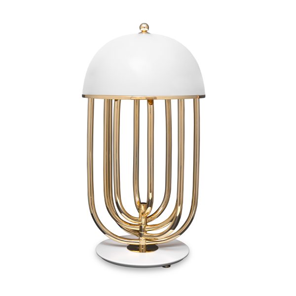 Turner is a large table lamp handmade in brass and Aluminium. The body has a gold plated finish, while the shade was lacquered a black matte on the outside and a gold powder paint on the inside, so as not to create an uncomfortable glaze for the user. Its five movable arcs can be rotated into the desired position, which gives this black table lamp a sense of fun, and allows you to create the best composition to fit your modern home decor.