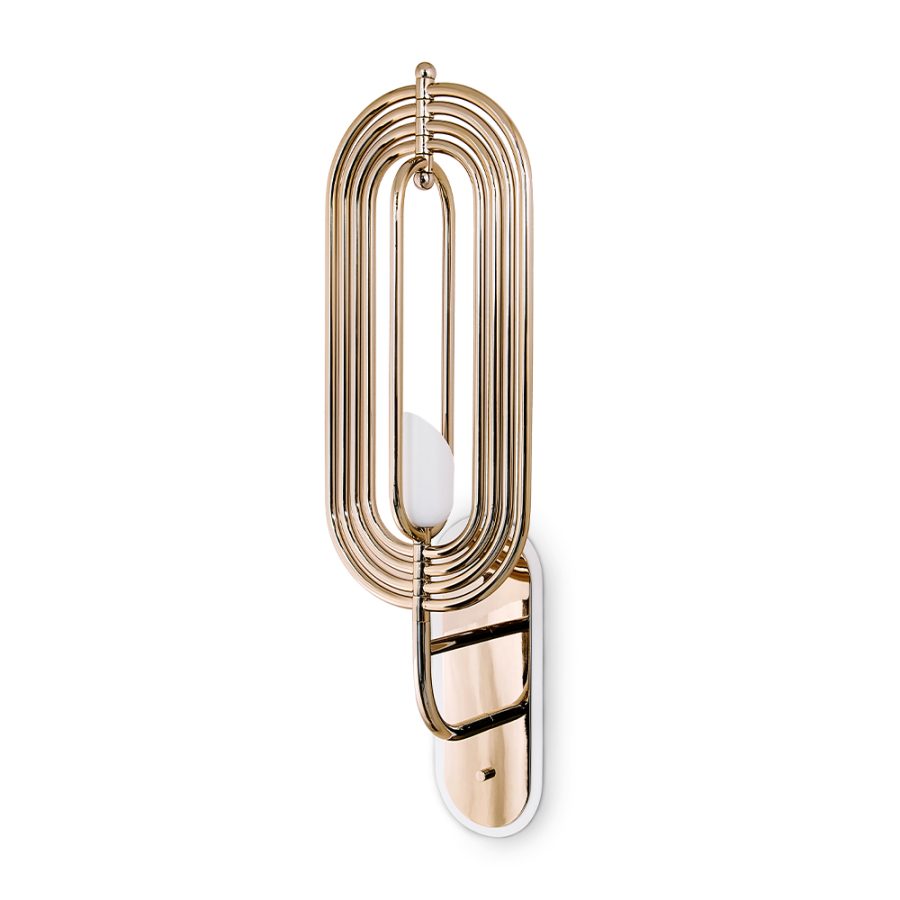 Turner is the perfect vintage addition to the Heritage Collection of DelightFULL. With 5 oval arcs made in brass, this vintage wall light was inspired by Tina Turner’s electrifying dance moves. Turner wall light features a small lamp shade made in Aluminium lacquered a matte white.