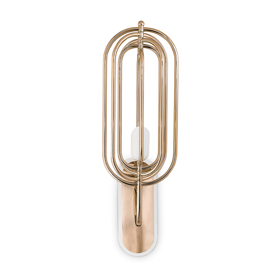 Turner is the perfect vintage addition to the Heritage Collection of DelightFULL. With 5 oval arcs made in brass, this vintage wall light was inspired by Tina Turner’s electrifying dance moves. Turner wall light features a small lamp shade made in Aluminium lacquered a matte white.